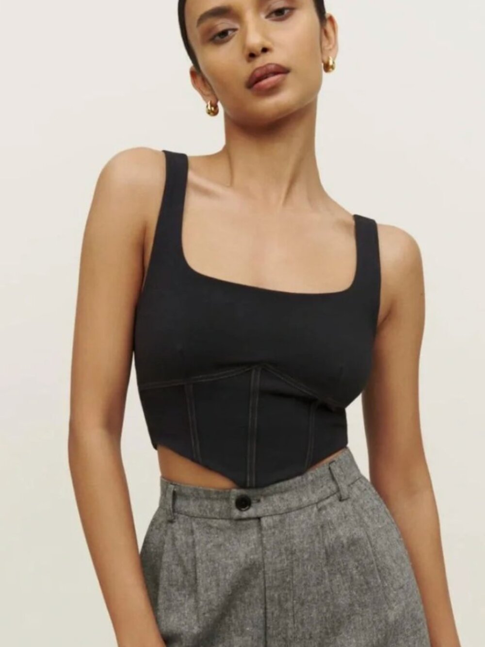 Reformation black corset top with white stitching detail